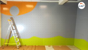 Mur d'escalade personnalisé peint par CLIMB IT pour centre de psychomotricité. Mur d'escalade pour enfants par CLIMB IT constructeur de murs d'escalade